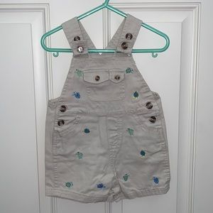 bt Kids,6-9m, Tan Coverall Shorts, Embroid. Blue & Green Turtles, Adjust. Straps